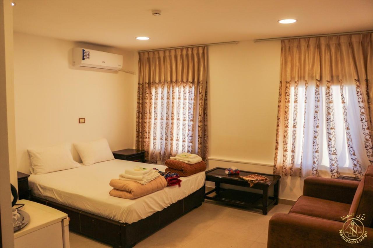Al Namteh Lodge Abil Bagian luar foto